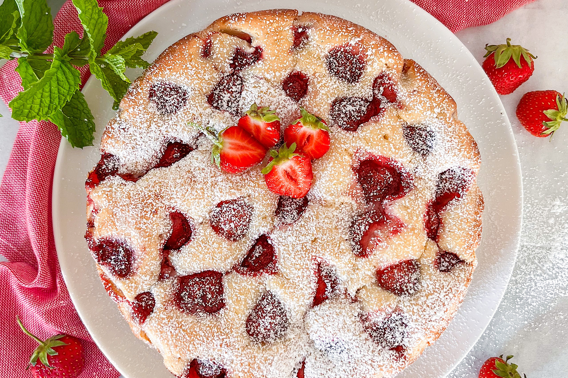 Baked Strawberry Cake with strawberries on top